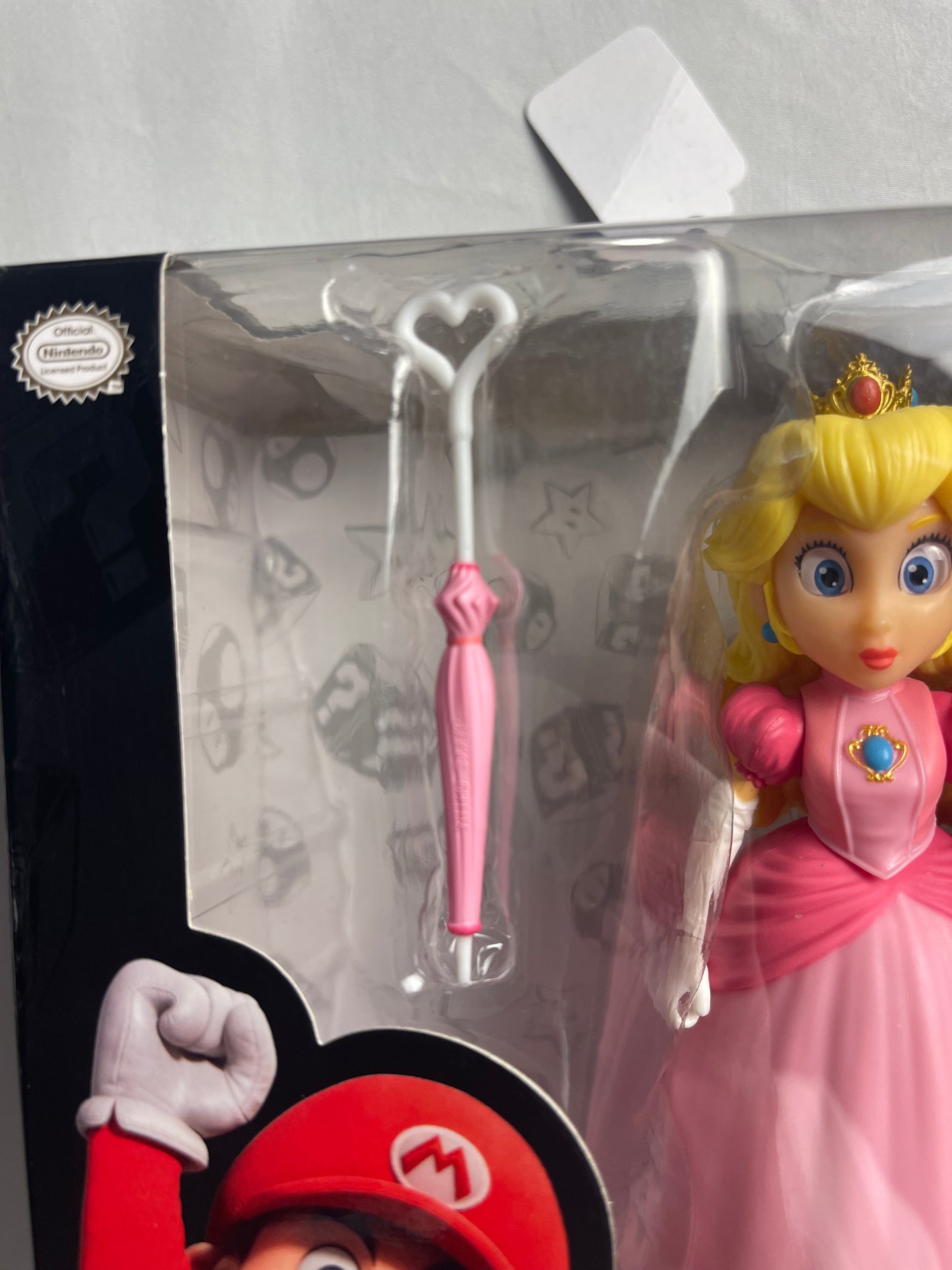 PEACH Nintendo The Super Mario Bros. Movie Action Figure with Umbrella (used)