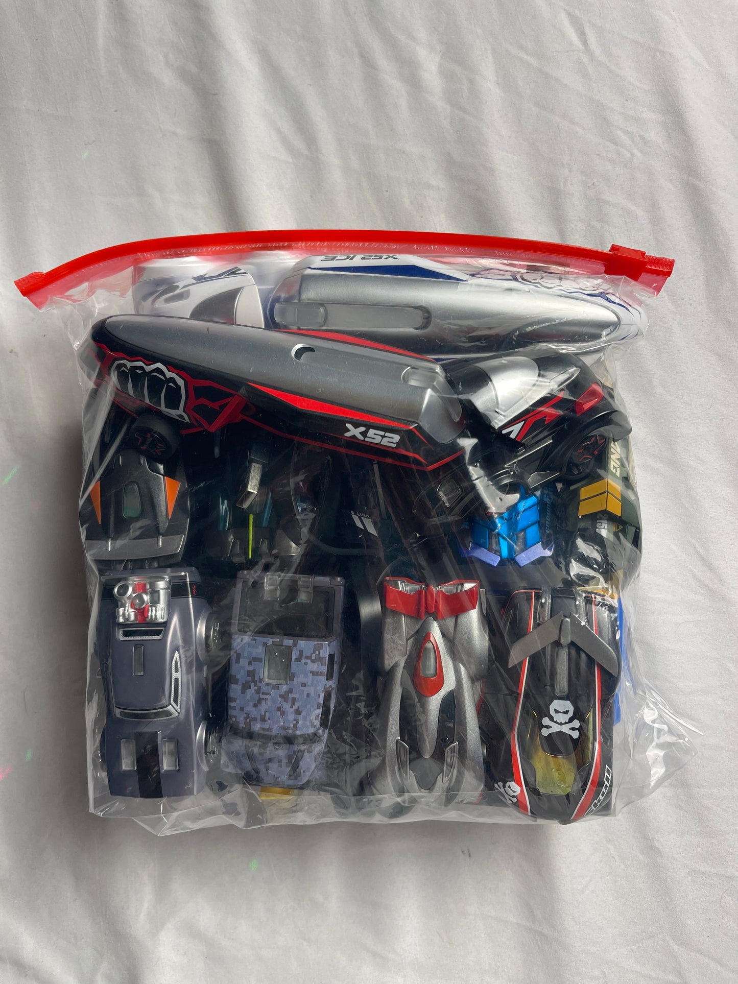 Anki Overdrive Lot Of 11 Vehicles & 2 Charger Docks 2 tire pads & some prop accessories