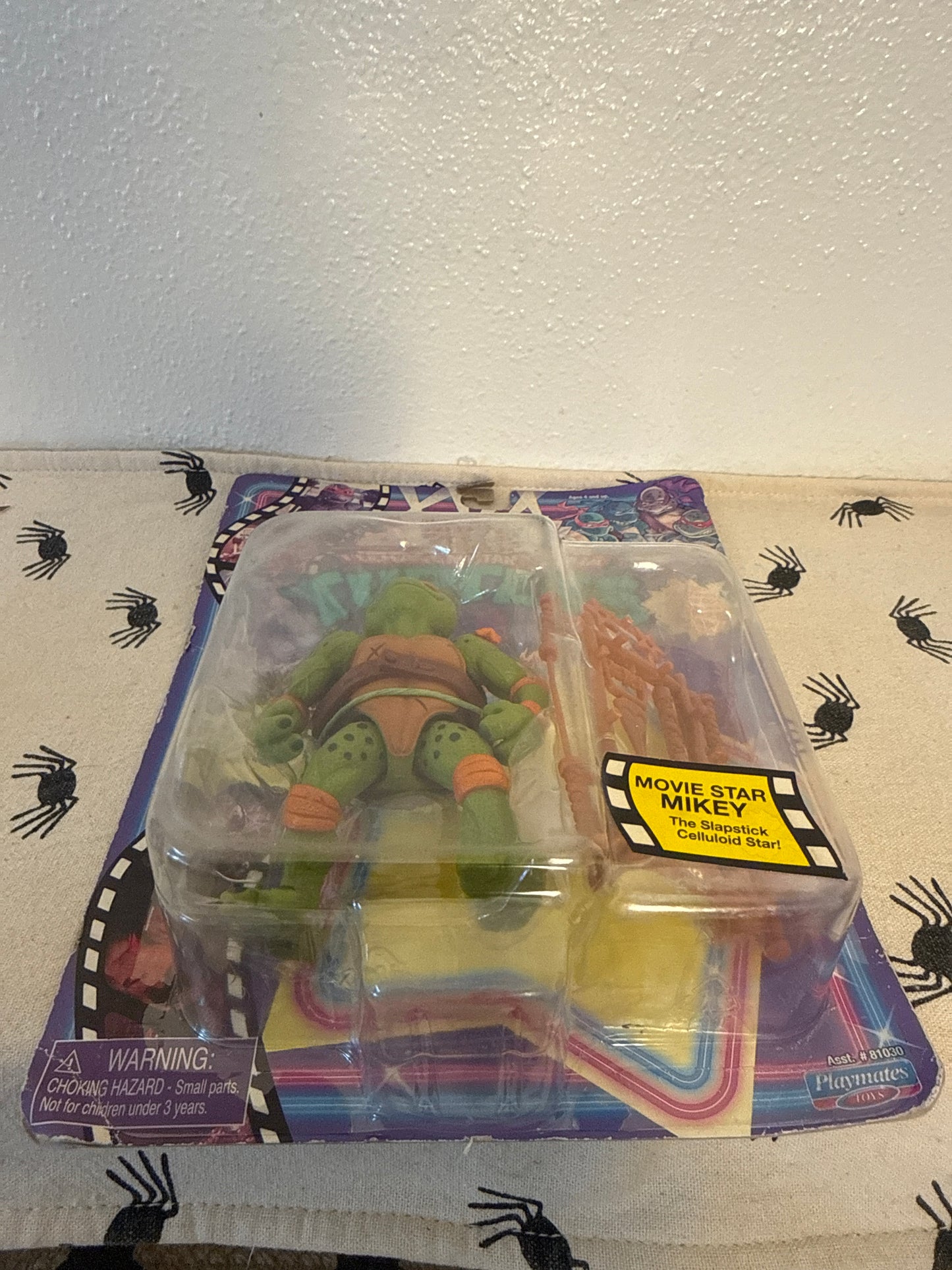 teenage mutant ninja turtles figure. movie star Mikey new in box(sun faded)(package damaged ) see photos