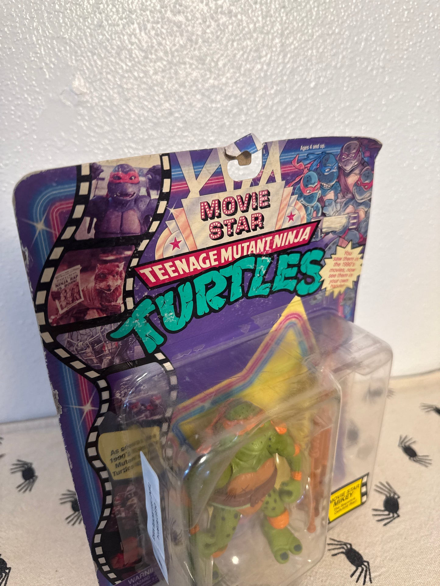 teenage mutant ninja turtles figure. movie star Mikey new in box(sun faded)(package damaged ) see photos