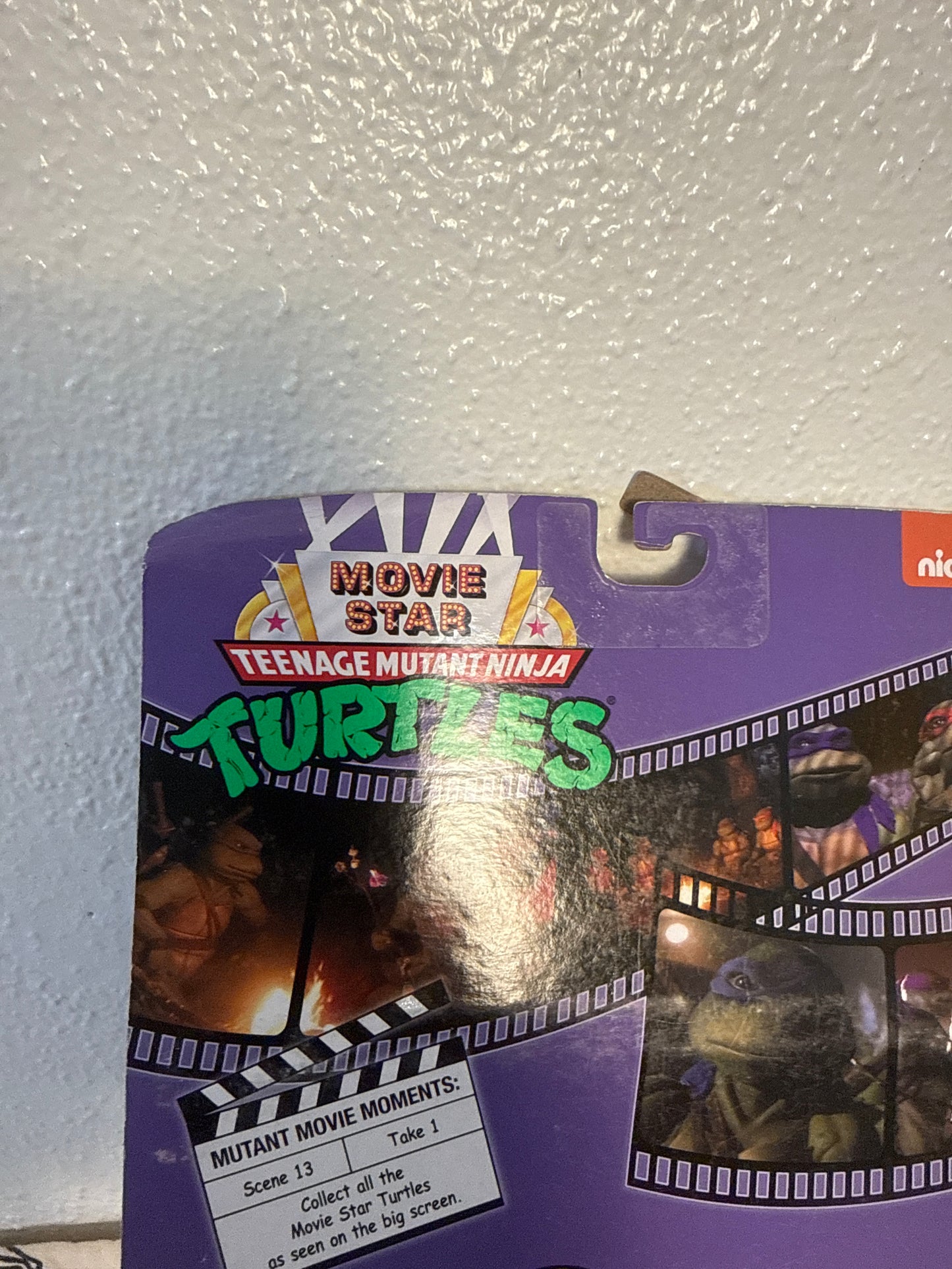 teenage mutant ninja turtles figure. movie star Mikey new in box(sun faded)(package damaged ) see photos